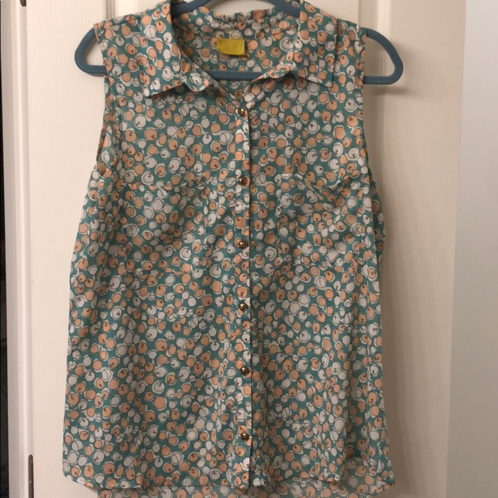 Sheer sleeveless button down top with cherry print